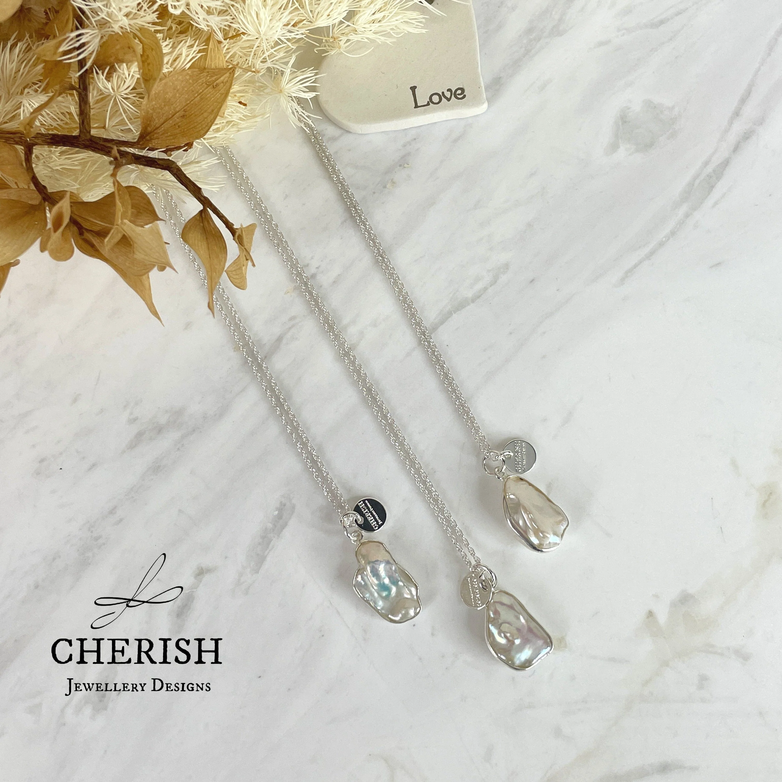 Keshi Bezelled pendant on ss rope chain